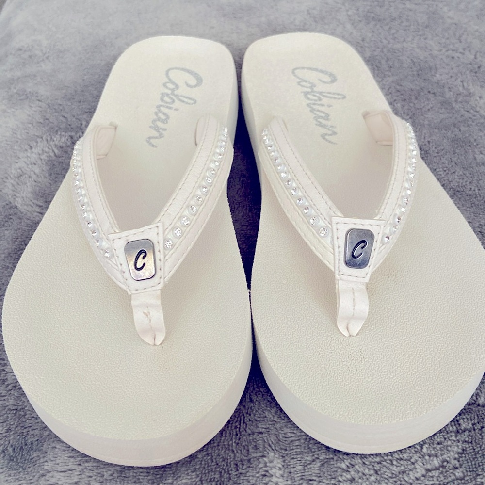 Cobian white rhinestone flip flops size 6.